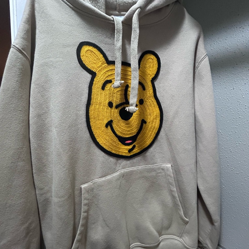 Cream and Yellow Sweatshirt with Playful Bear Graphic